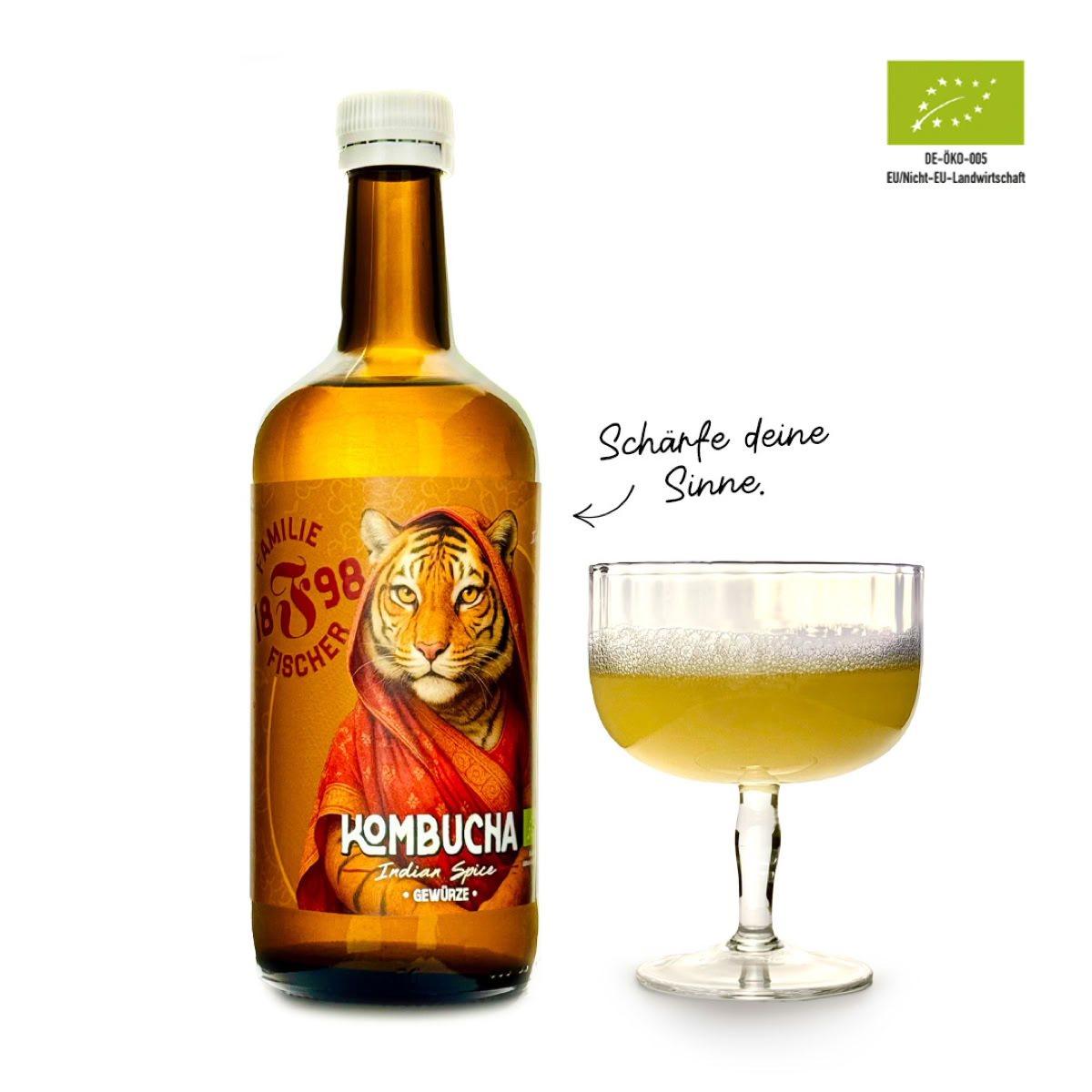Eine braune Flasche mit einem Tigerbild und der Aufschrift "Kombucha" neben einem gefüllten Glas.